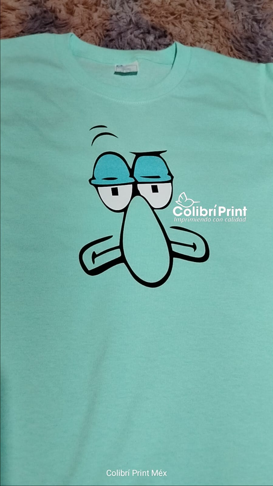 Playera de caricatura azul